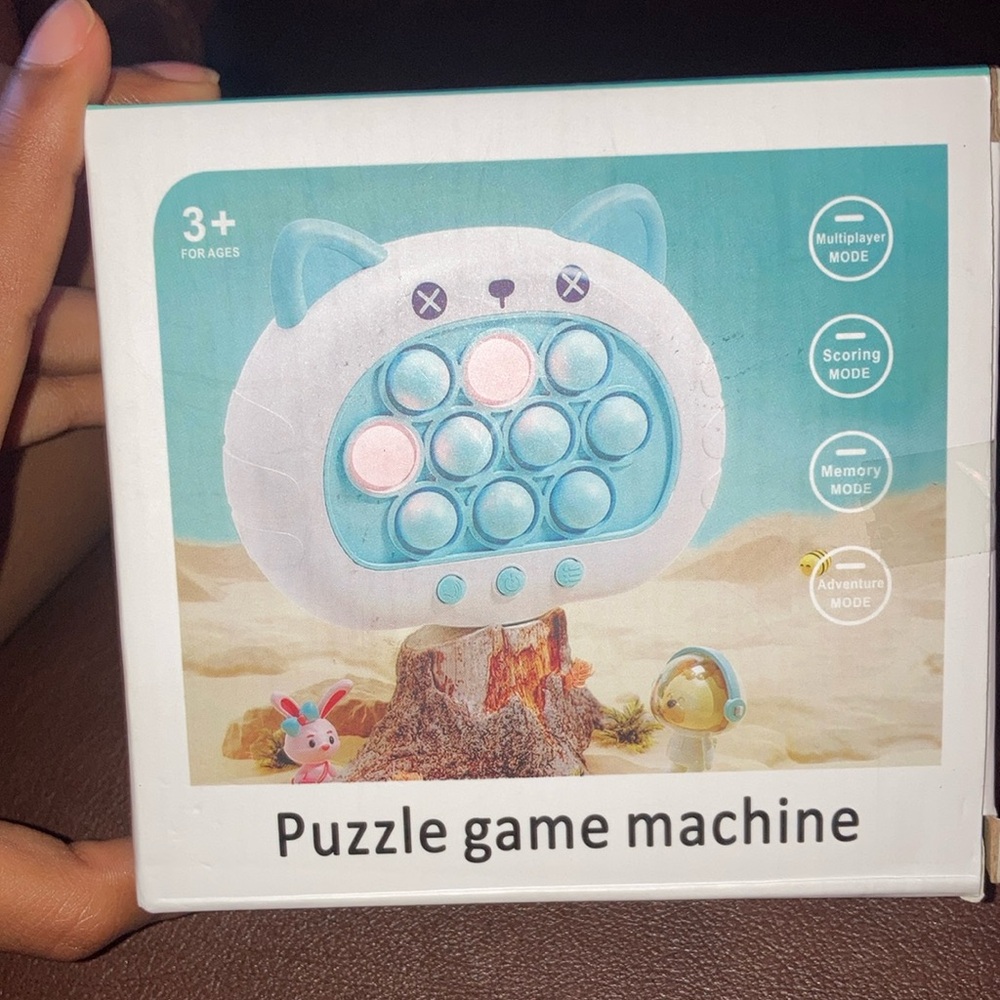 Puzzle game machine, blue, 2oz.